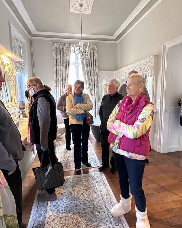 Visitors exploring the château interiors during Château de la Boutinière Events, taking part in a guided Tea and Tour.