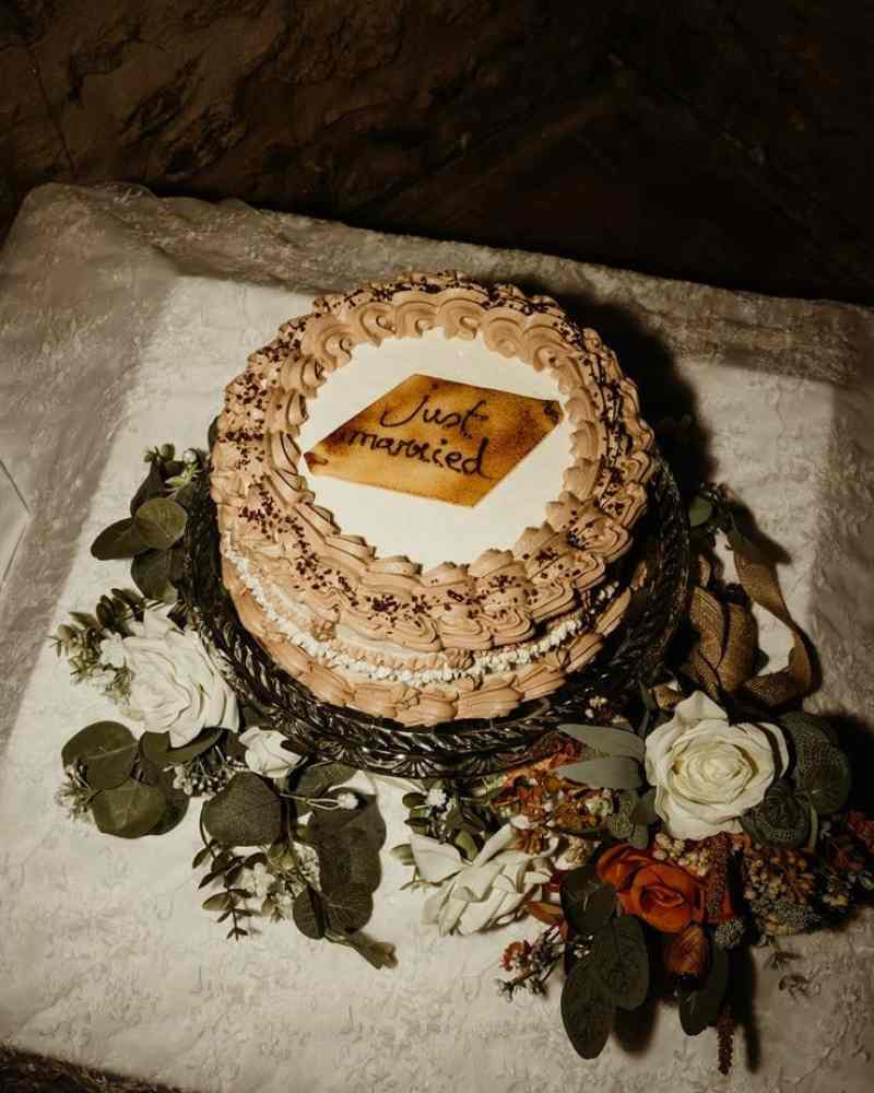 Wedding cake displayed at Château de la Boutinière during an intimate micro wedding celebration.