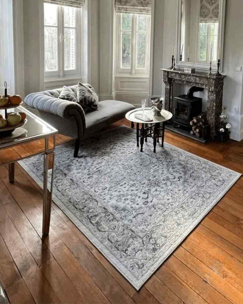 Reception room at Château de la Boutinière showing a patterned rug supplied by Elegance Rugs, one of our Château partners.