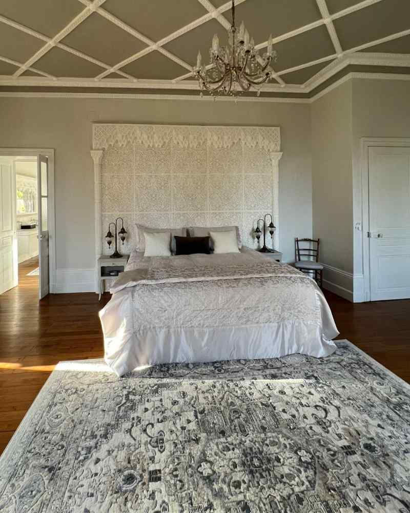 Bridal suite bedroom at Château de la Boutinière featuring an Emperor-size bed by Hypnos Beds, created as part of a partner collaboration.