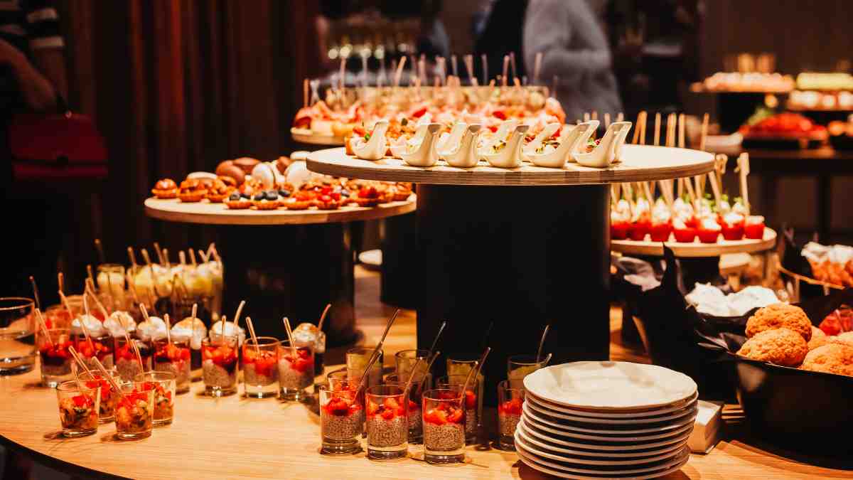 Buffet of canapés and small dishes prepared for guests at a corporate retreat venue.