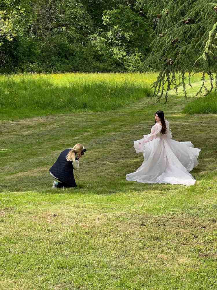 Louren photographing Doreen in the gardens at Château de la Boutinière.